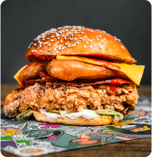 #010 - Libertine fried chicken breast, crispy smoky bacon, deep fried pickles, hot sauce.