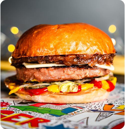 #124 - Signature plant based patty, plant based brioche, Applewood smoked cheese.