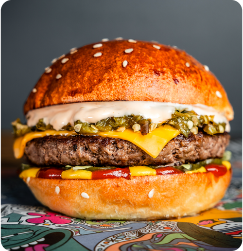 #017- Signature beef patty, American cheese, charred green chillis, dirty mayo.