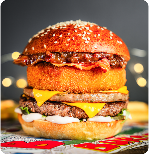 #028  - Signature beef patty, Aubrey Allen sausage patty, deep fried camembert, festive chutney.