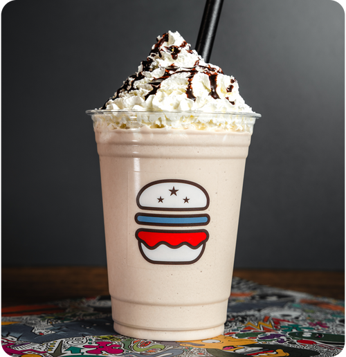 Chocolate & Vanilla Fudge - Hand-spun chocolate shake, vanilla fudge sauce, whipped cream.
