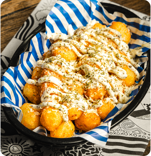 Truffle & Parmesan Tots - American cheese sauce, truffle mayo, Parmesan