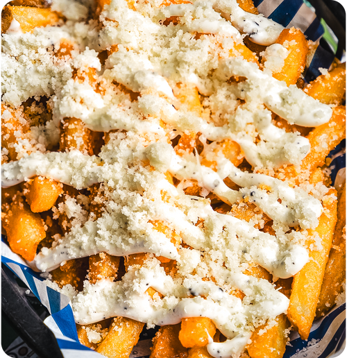 Truffalo Fries - House fries coated in Buffalo hot sauce, truffle mayo, parmesan.